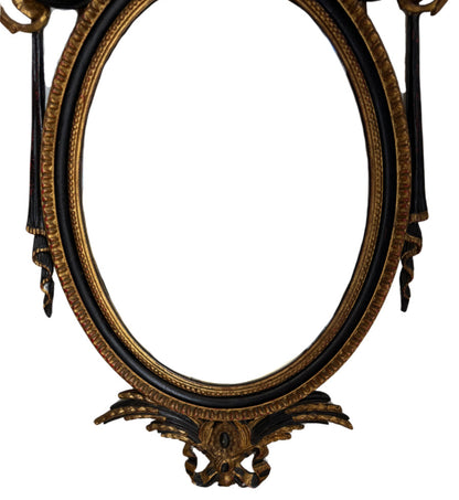 Antique Neoclassical Handcarved Black and Giltwood Mirror with Coin Medallion